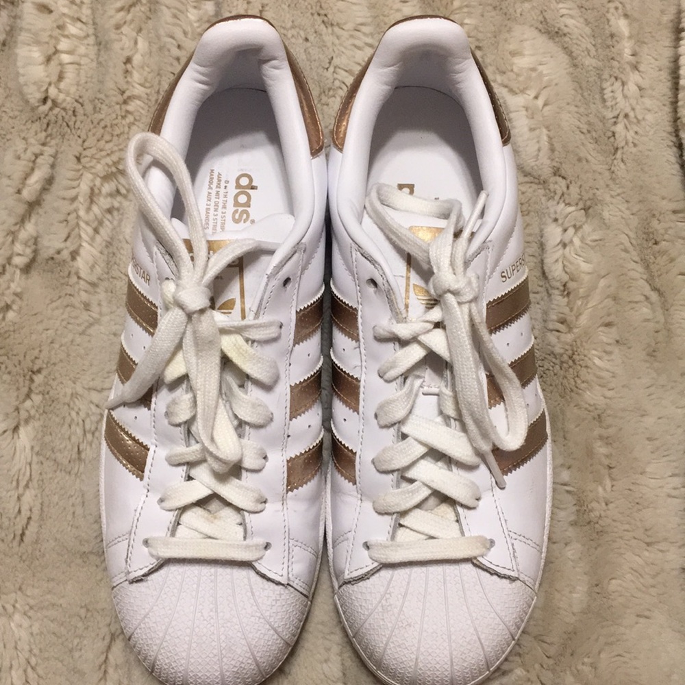 Adidas white with rose gold stripes sneakers